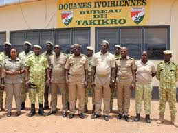 A group of men in uniform standing in front of a building

AI-generated content may be incorrect.