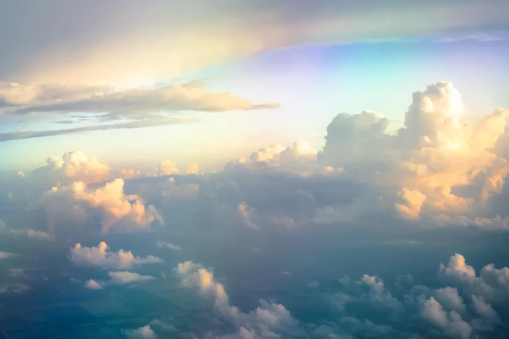 Atmosphere-with-clouds-and-rainbow-edited.jpg